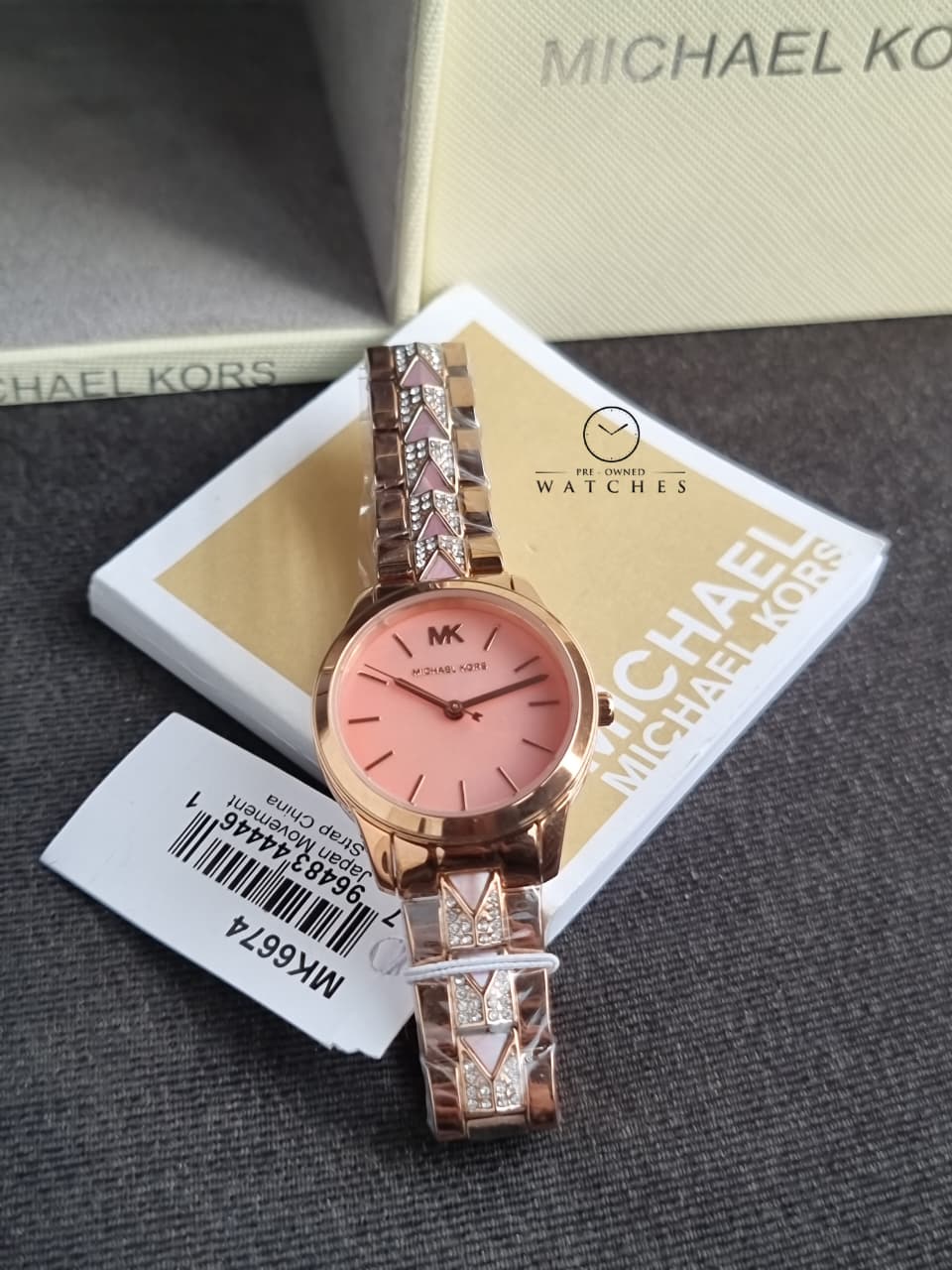 Michael Kors Women’s Quartz Stainless Steel Mother of Pearl Dial 38mm Watch MK6674