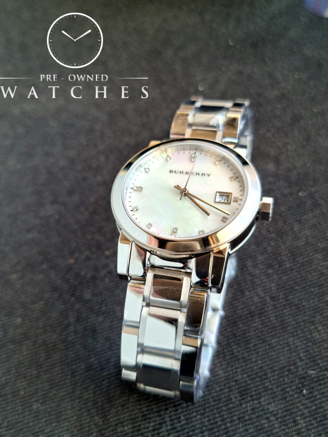 Burberry Swiss Rare Diamonds Silver Mother Of Pearl Date Dial 34mm Women Stainless Steel Wrist Watch The City BU9125