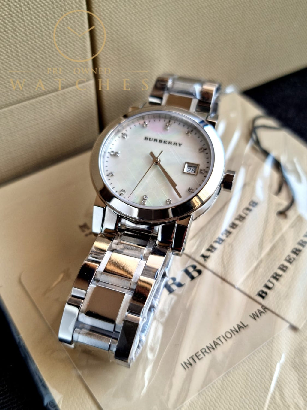 Burberry Swiss Rare Diamonds Silver Mother Of Pearl Date Dial 34mm Women Stainless Steel Wrist Watch The City BU9125
