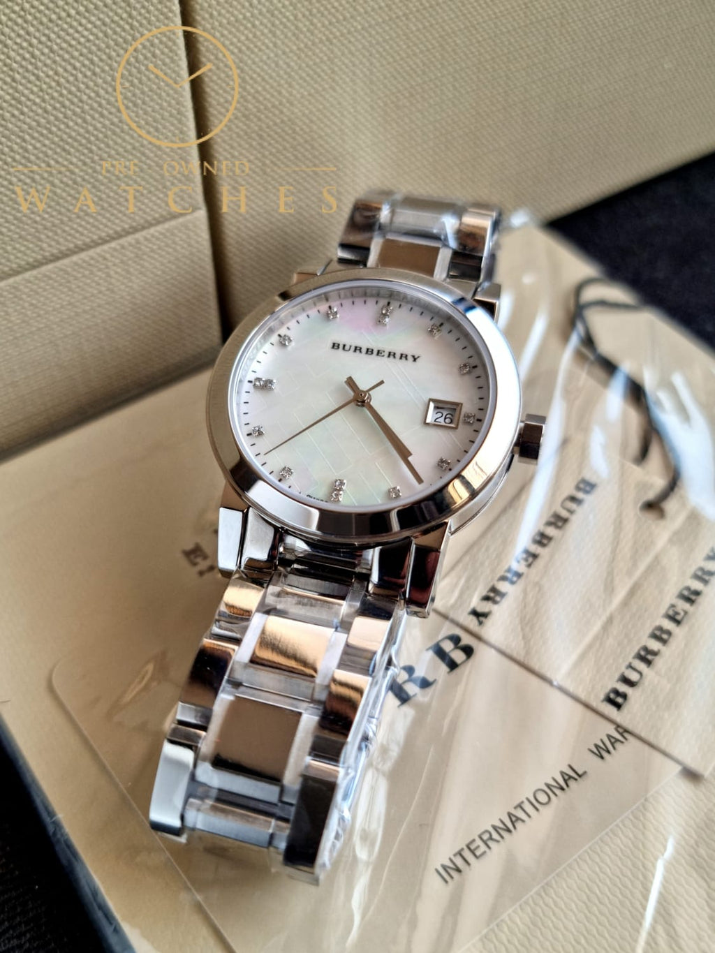 Burberry Swiss Rare Diamonds Silver Mother Of Pearl Date Dial 34mm Women Stainless Steel Wrist Watch The City BU9125