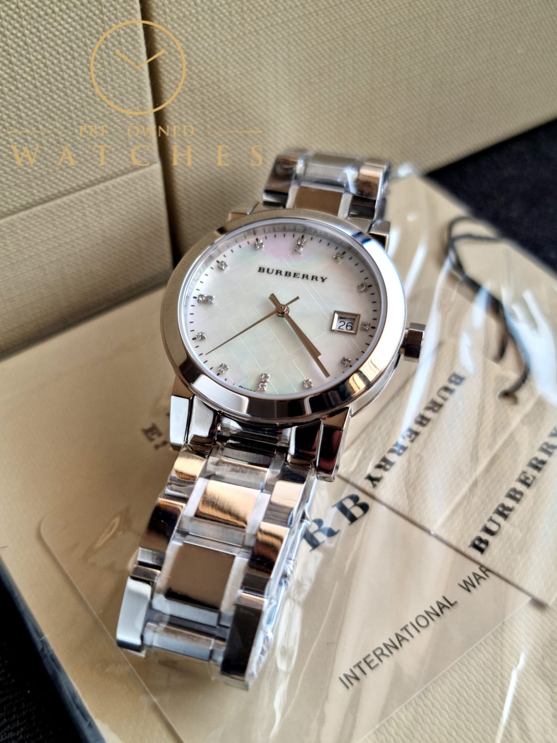 Burberry Swiss Rare Diamonds Silver Mother Of Pearl Date Dial 34mm Women Stainless Steel Wrist Watch The City BU9125