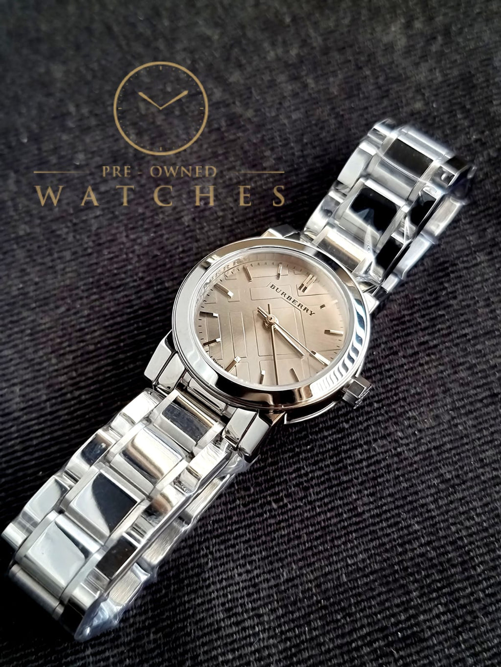 Burberry Women’s Swiss Made Quartz Stainless Steel Grey Check Stamped Dial 26mm Watch BU9229