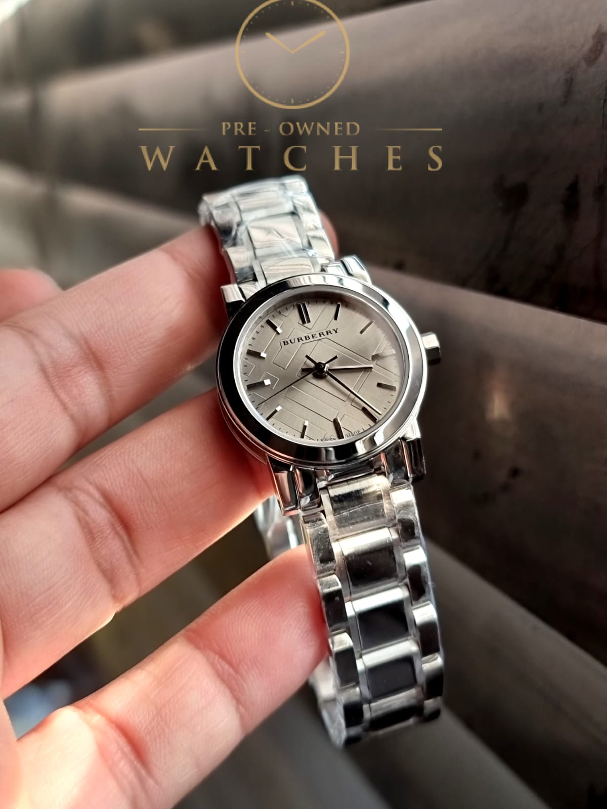 Burberry Women’s Swiss Made Quartz Stainless Steel Grey Check Stamped Dial 26mm Watch BU9229