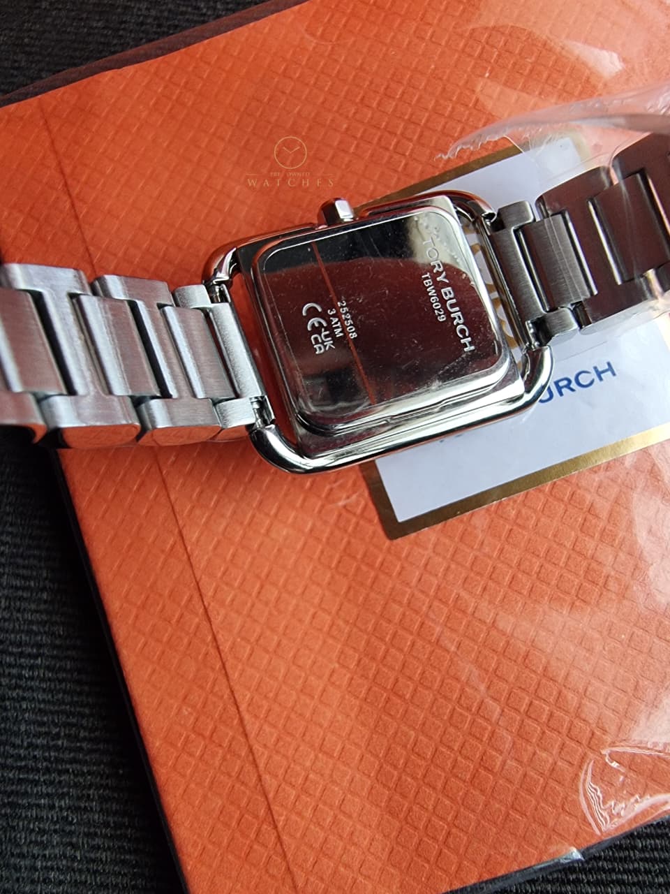 Tory Burch TBW6029 – Gold Metallic Grey Steel Women’s Watch