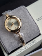 Michael Kors Izzy Quartz Gold Dial Ladies Watch Item No. MK4929