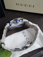 Gucci Men’s Analog Quartz Display Swiss Made Stainless Steel Silver 44mm Watch YA101201