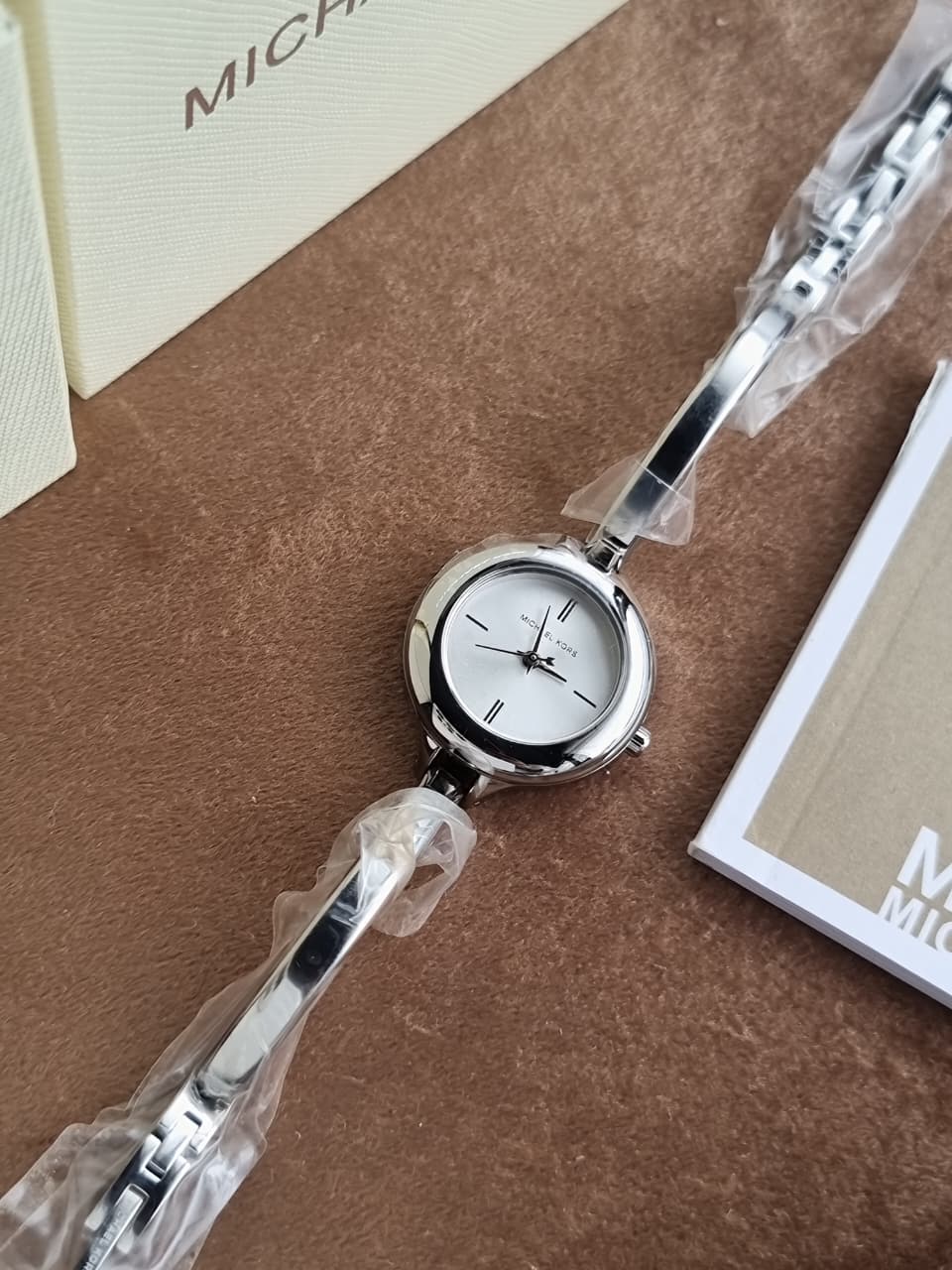 Michael Kors Izzy Silver Dial Silver Stainless Steel Bangle Quartz Watch 28mm for Ladies – MK4930