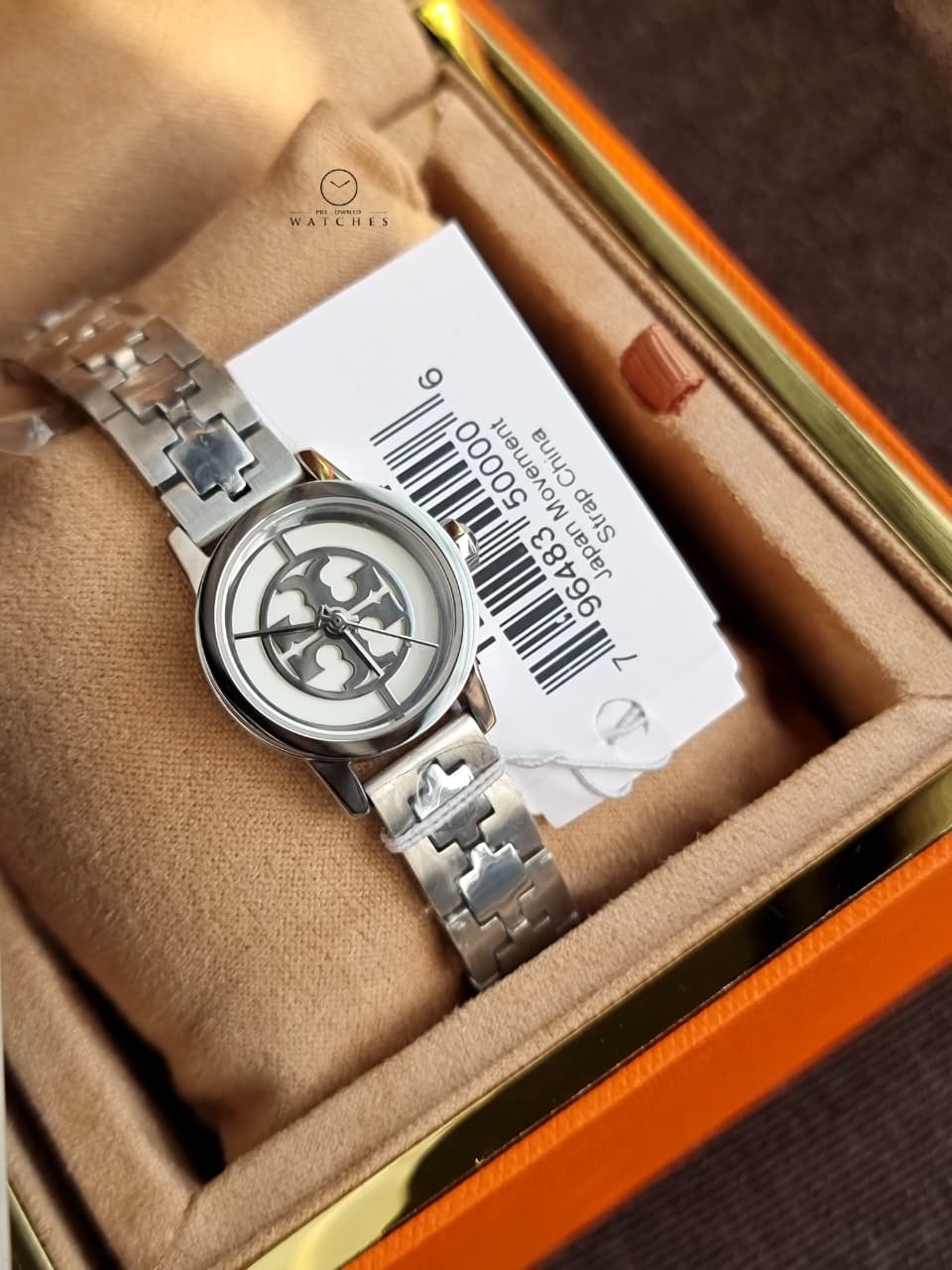 Tory Burch Reva Silver Stainless Steel Cream Dial Quartz Watch for Ladies - TBW4044