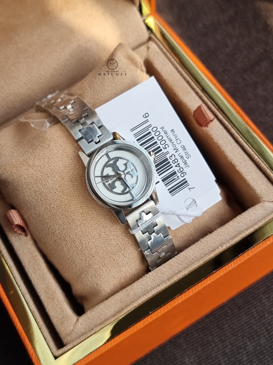 Tory Burch Reva Silver Stainless Steel Cream Dial Quartz Watch for Ladies - TBW4044