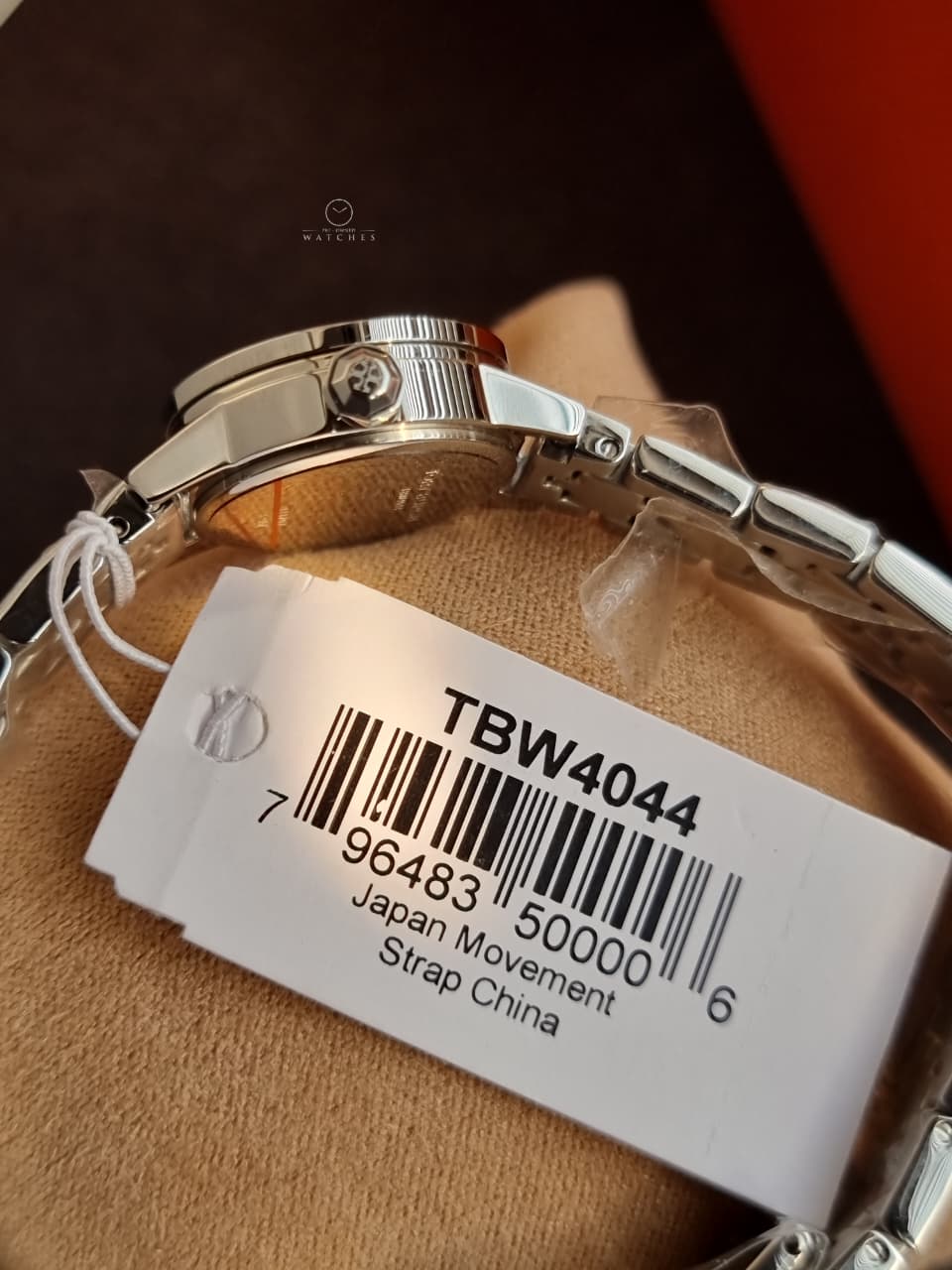 Tory Burch Reva Silver Stainless Steel Cream Dial Quartz Watch for Ladies - TBW4044