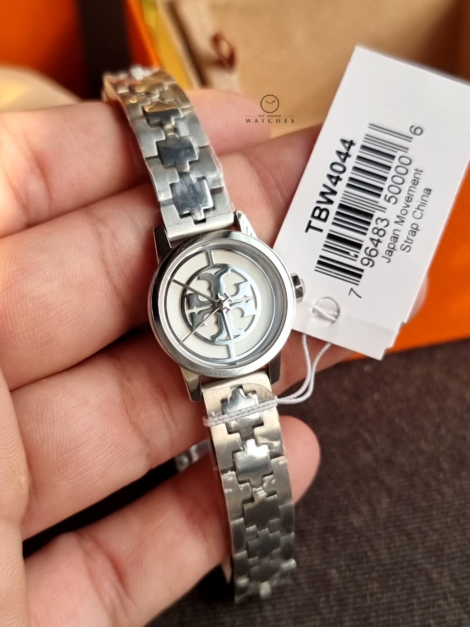 Tory Burch Reva Silver Stainless Steel Cream Dial Quartz Watch for Ladies - TBW4044