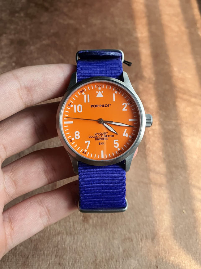 Pop-Pilot Summer Hits BKK Quartz Watch – Orange Dial & Navy Nylon Strap – P4260362630024 Main Image