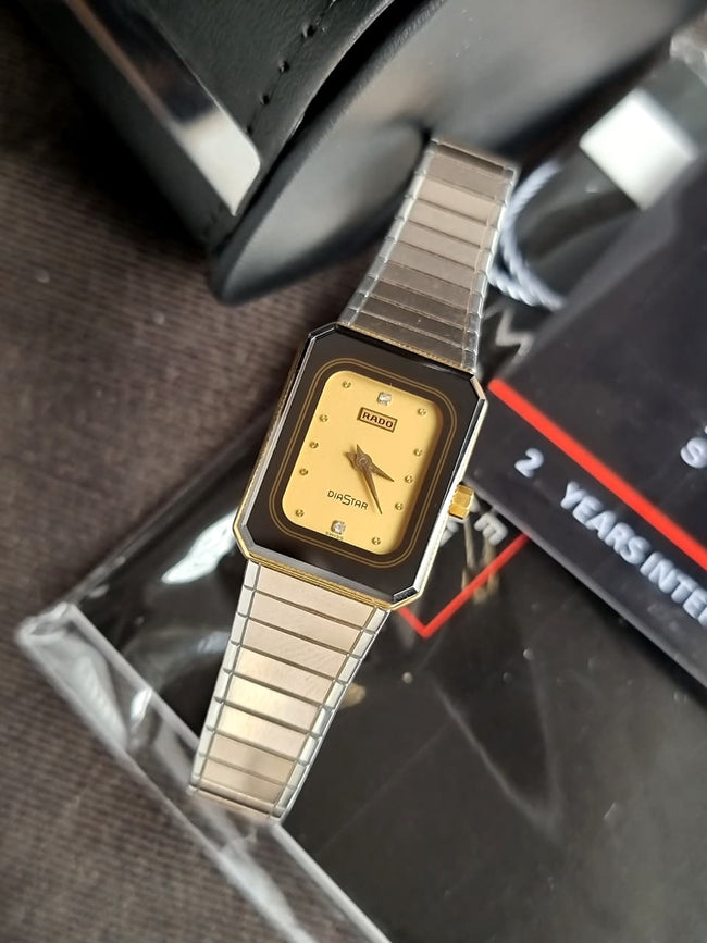 Rado Diastar Ladies Watch Silver Chain Golden Dial Quartz Watch Main Image