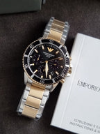 Emporio Armani World Explorer Men's Solar Chronograph Watch – Black Dial Two-Tone Stainless Steel – AR11680