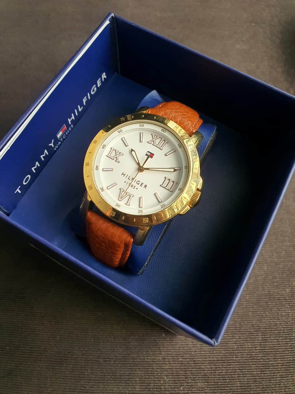 Tommy Hilfiger  Women's Quartz Watch – 38mm Gold-Tone Case, White Dial & Brown Leather Strap – 1781438