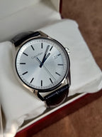 Calvin Klein Formality Men's Quartz Watch – Silver Dial, Black Leather Strap & Stainless Steel Case – K4M211C6