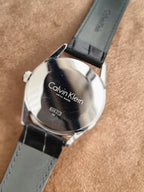 Calvin Klein Formality Men's Quartz Watch – Silver Dial, Black Leather Strap & Stainless Steel Case – K4M211C6