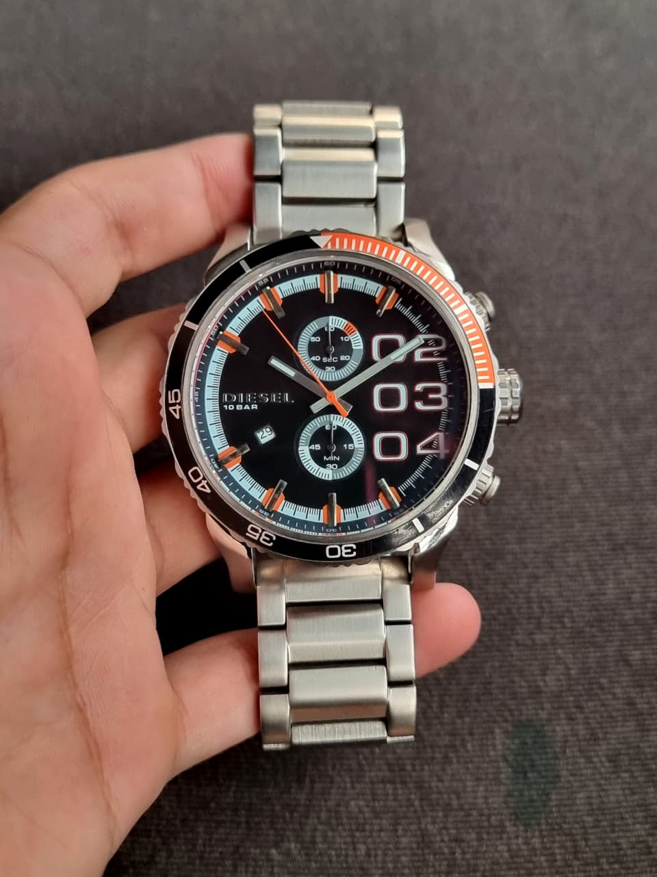 Diesel Men's Quartz Watch – Black Dial, Silver Stainless Steel Bracelet, Black & Orange Bezel, 50mm