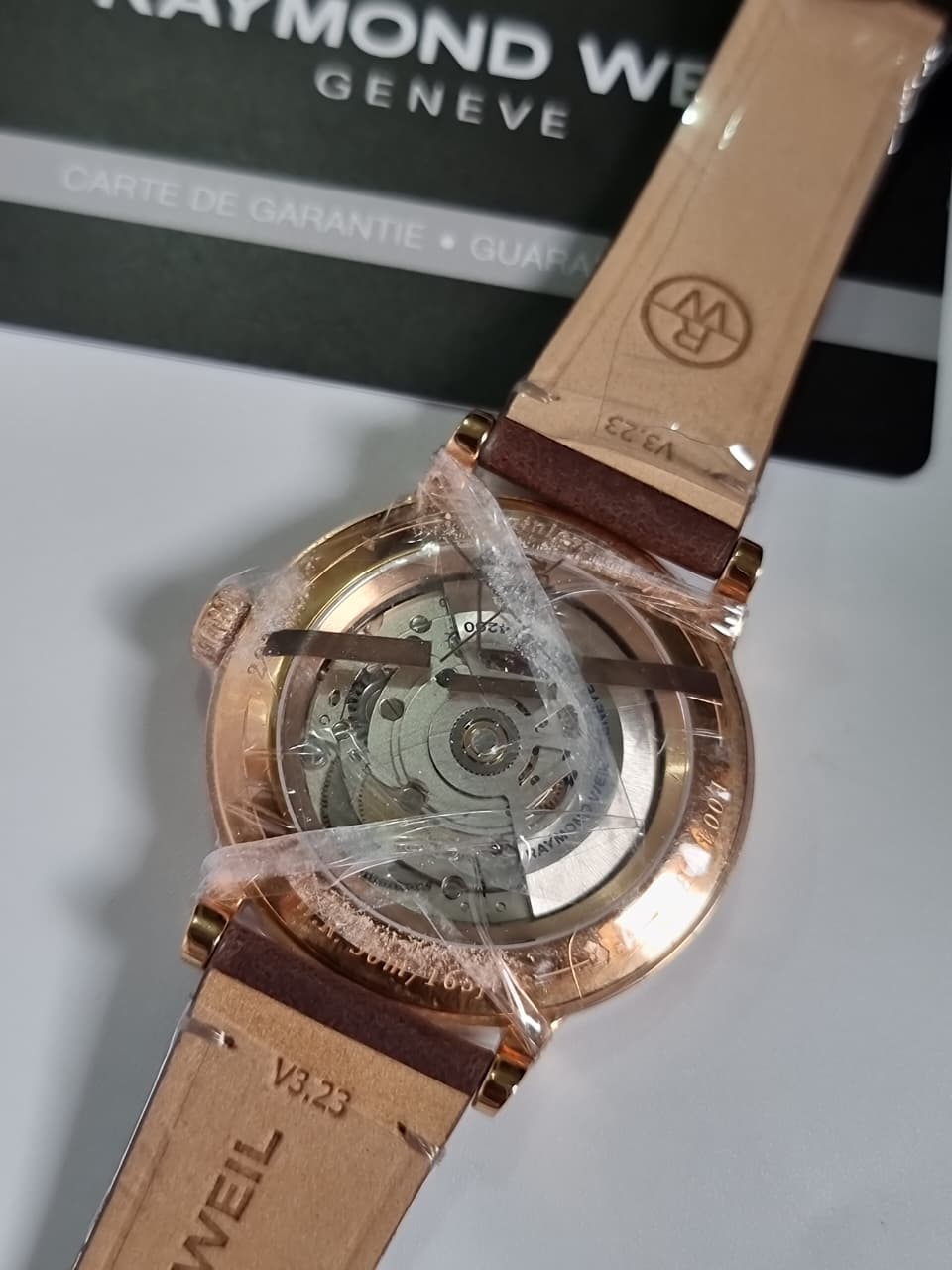 Raymond Weil Millesime Automatic Men's Watch 39mm – Silver Dial, Brown Leather Strap, Skeleton Case Back