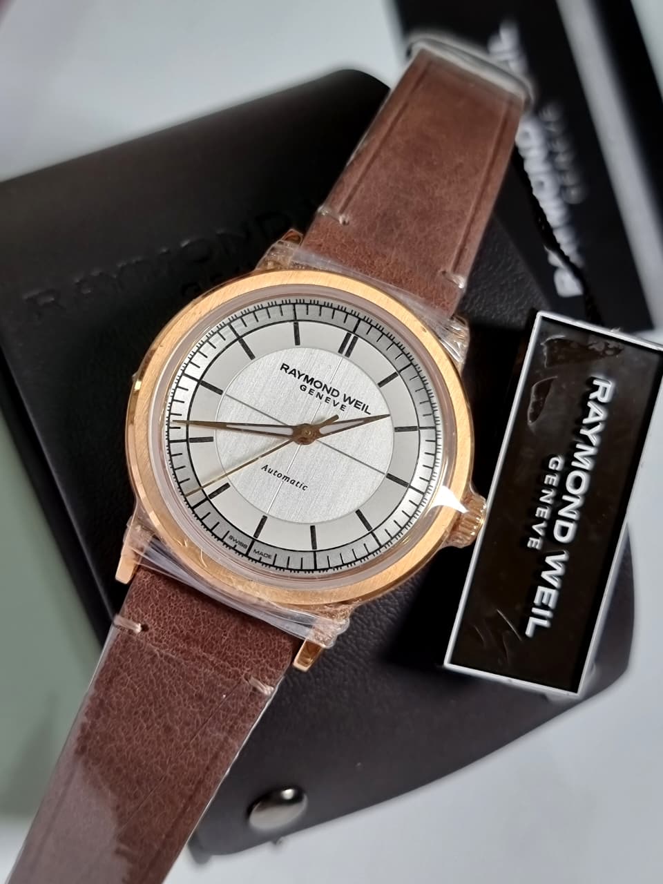 Raymond Weil Millesime Automatic Men's Watch 39mm – Silver Dial, Brown Leather Strap, Skeleton Case Back
