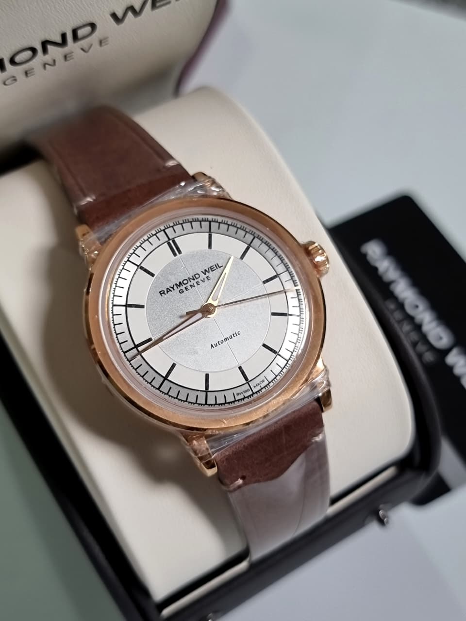 Raymond Weil Millesime Automatic Men's Watch 39mm – Silver Dial, Brown Leather Strap, Skeleton Case Back
