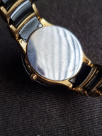Rado Centrix Two-tone Ceramic Strap Black Dial Quartz Watch for Ladies - R30930712