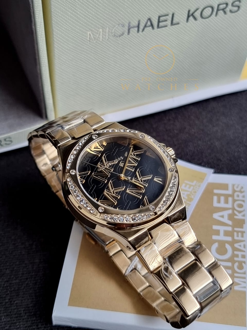 Michael Kors Women’s Quartz Gold Stainless Steel Black Dial 37mm Watch MK7404