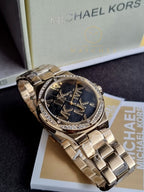 Michael Kors Women’s Quartz Gold Stainless Steel Black Dial 37mm Watch MK7404