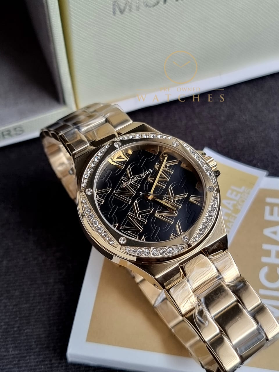 Michael Kors Women’s Quartz Gold Stainless Steel Black Dial 37mm Watch MK7404