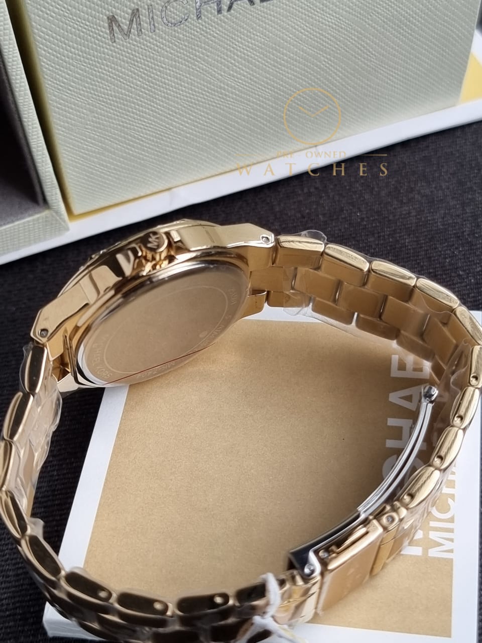 Michael Kors Women’s Quartz Gold Stainless Steel Black Dial 37mm Watch MK7404