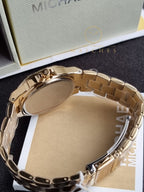 Michael Kors Women’s Quartz Gold Stainless Steel Black Dial 37mm Watch MK7404