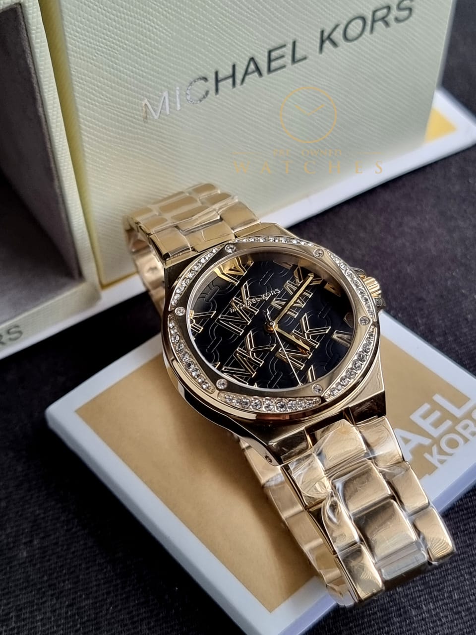 Michael Kors Women’s Quartz Gold Stainless Steel Black Dial 37mm Watch MK7404