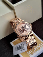 Michael Kors Women’s Quartz Rose Gold Stainless Steel Rose Gold Dial 37mm Watch MK1063