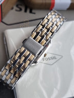 Fossil Women's Raquel Three-Hand Date Silver and Gold Two-Tone Stainless Steel Bracelet Watch (Model: ES5368)