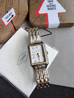 Fossil Women's Raquel Three-Hand Date Silver and Gold Two-Tone Stainless Steel Bracelet Watch (Model: ES5368)