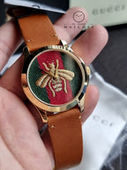 Gucci G-Timelss Analog ETA Quartz Brown Leather unisex-adult Watch(Model:YA126451