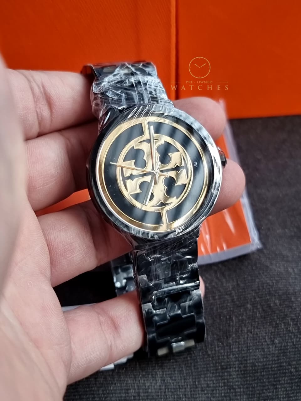 Tory Burch Reva Black Stainless Steel Gold Logo Dial 36mm  display picture 3