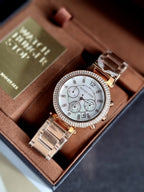 Michael Kors Women’s Quartz Stainless Steel Mother of pearl Dial 39mm Watch MK5491