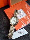 Tory Burch Oval White Dial Gold Steel Strap Watch For Women - TBW6032
