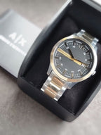 A｜X Armani Exchange Men's Three-Hand Date Silver and Gold Two-Tone Stainless Steel Bracelet Watch AX2453