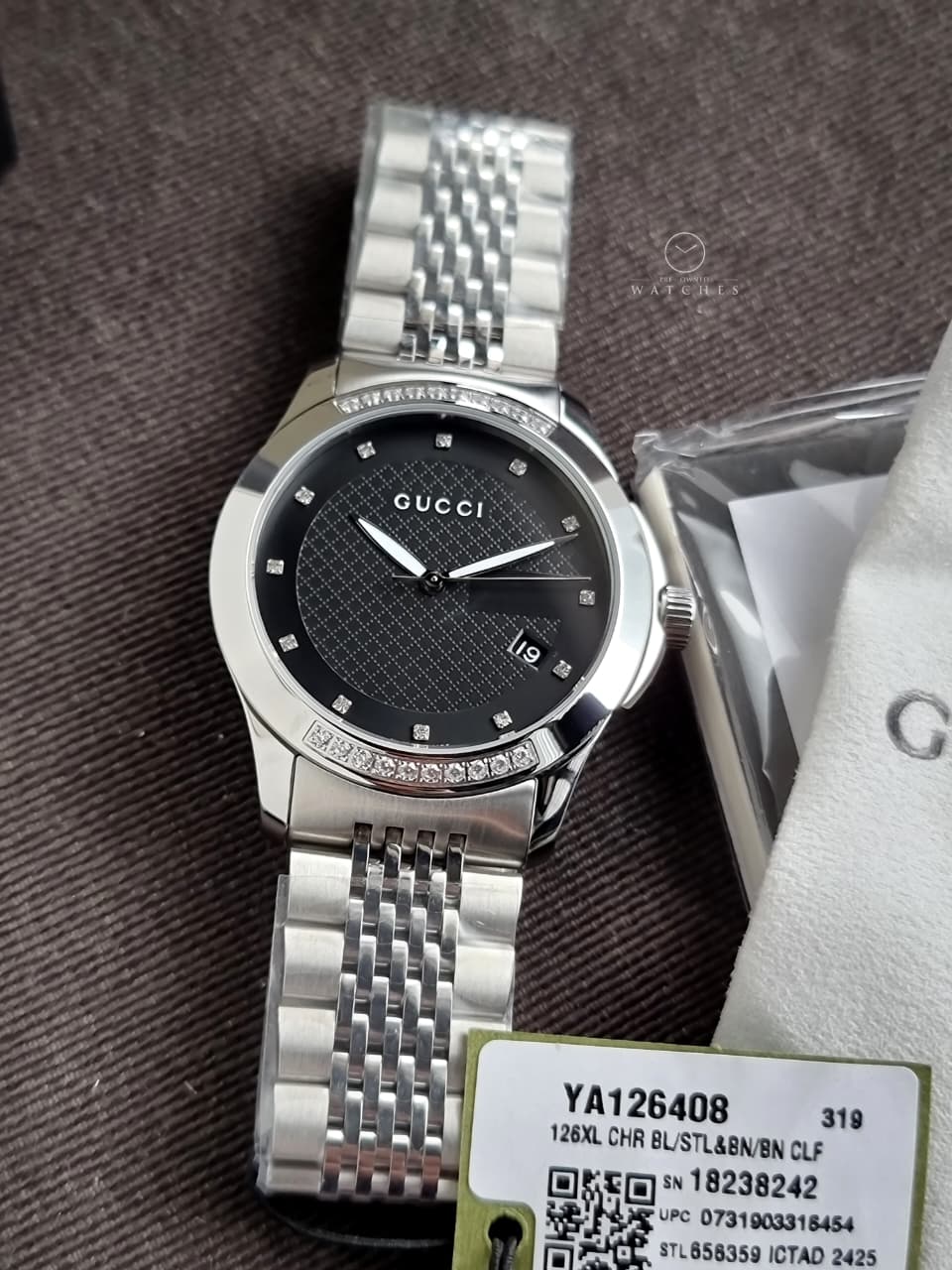 Gucci Women’s Swiss Made Quartz Silver Stainless Steel Black Dial 38mm Watch YA126408