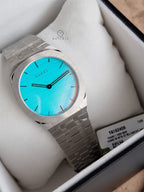 Gucci Unisex Swiss Made Quartz Silver Stainless Steel White Dial-Ocean Blue Glass 38mm Watch YA163409