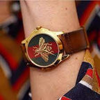 Gucci G-Timelss Analog ETA Quartz Brown Leather unisex-adult Watch(Model:YA126451