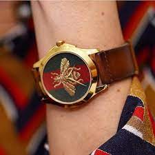 Gucci G-Timelss Analog ETA Quartz Brown Leather unisex-adult Watch(Model:YA126451