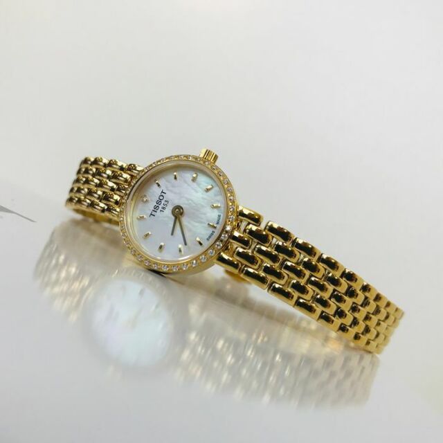 Tissot lovely gold discount watch