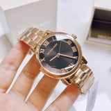 Michael Kors Women’s Quartz Rose Gold Stainless Steel Black Dial 39mm Watch MK3585