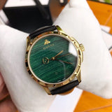 Gucci Men’s Analog Swiss Made Quartz Leather Strap Malachite Green Dial 38mm Watch YA126463